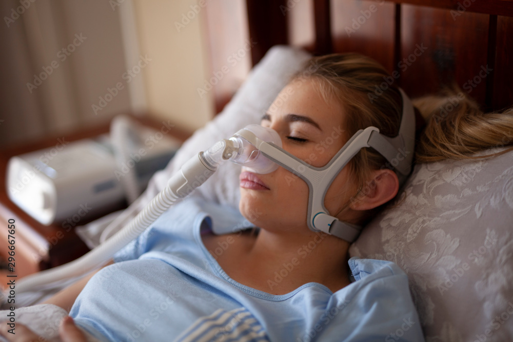 Cpap machine, Woman using sleeping sleep apnea