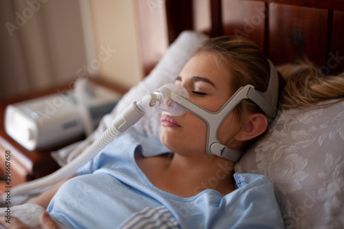 Cpap machine, Woman using sleeping sleep apnea
