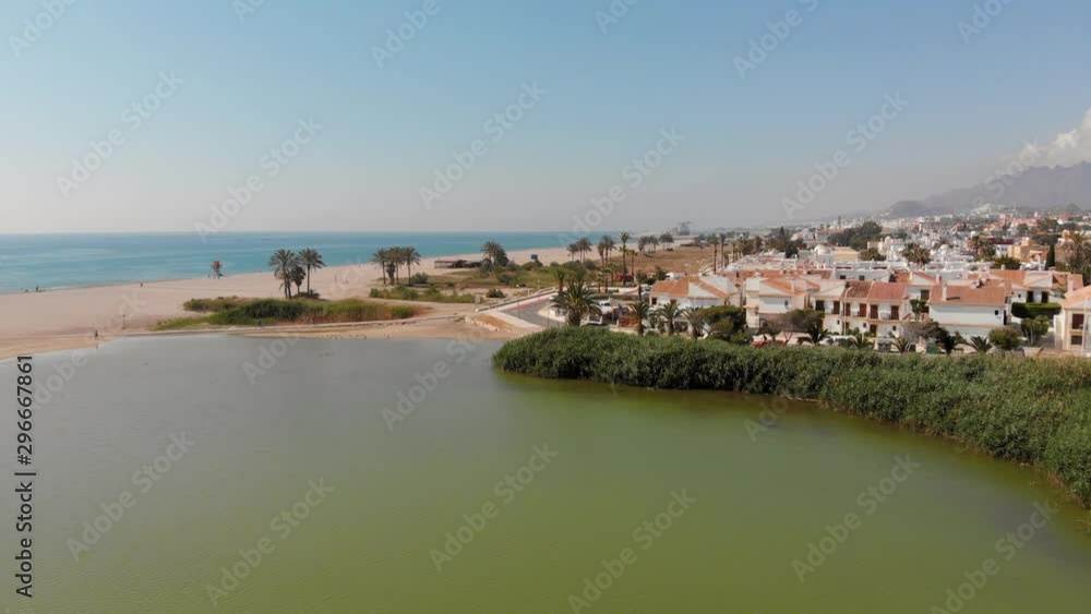 The beach of Playas de Vera in Almeria, Southern Spain. Aerial shot of a hot summer day. The beach of Playas de Vera in Almeria, Southern Spain. Aerial shot of a hot summer day.