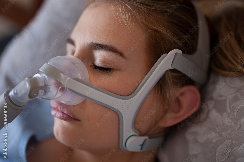 Close up cpap machine, over nose mask