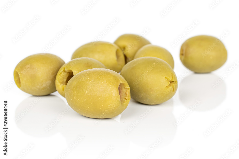 Group of eight whole marinated green olive isolated on white background Group of eight whole marinated green olive isolated on white background