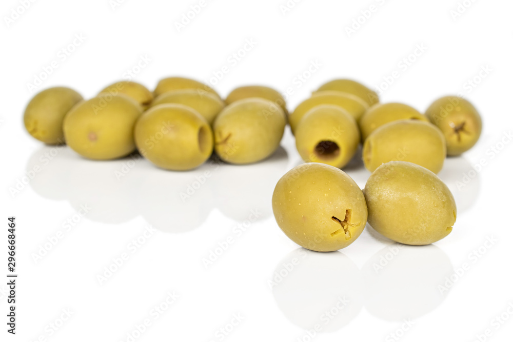 Lot of whole marinated green olive isolated on white background Lot of whole marinated green olive isolated on white background