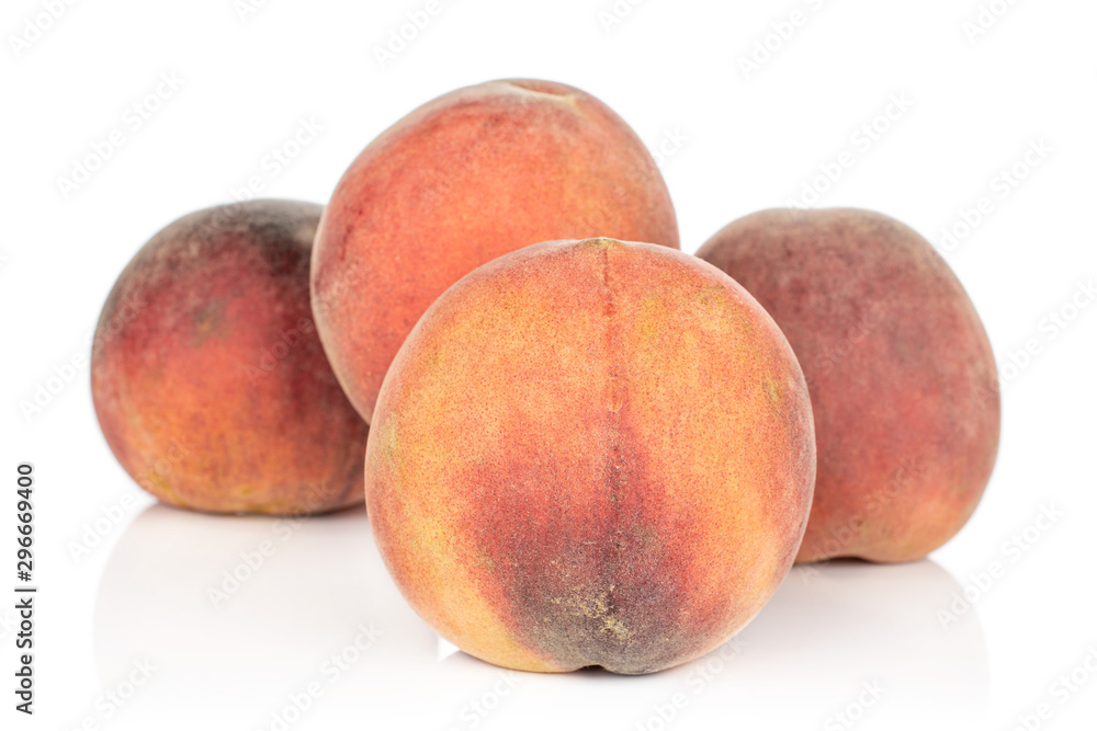 Group of four whole sweet red peach isolated on white background Group of four whole sweet red peach isolated on white background