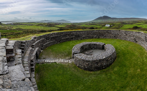 cahergall stone fort in the south west coast of ireland on the ring of kerry during autumn on a cloudy day photo