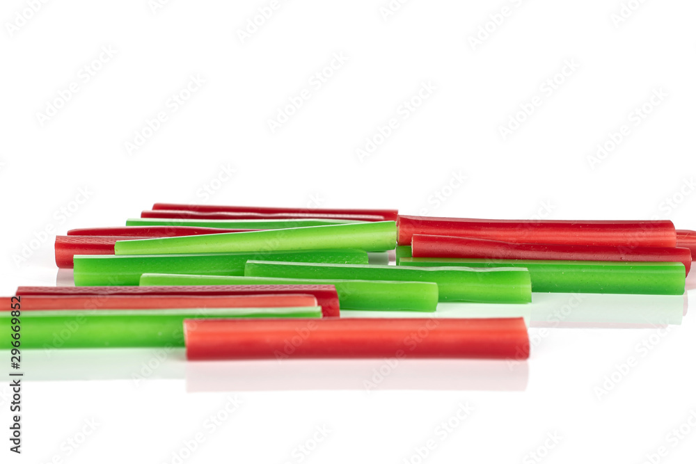 Fototapeta premium Lot of whole disordered sweet stick candy isolated on white background