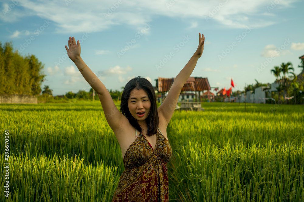 young happy and beautiful Asian woman enjoying nature at rice field. sweet Korean girl exploring countryside during holiday travel in wanderlust and tourism concept young happy and beautiful Asian woman enjoying nature at rice field. sweet Korean girl exploring countryside during holiday travel in wanderlust and tourism concept