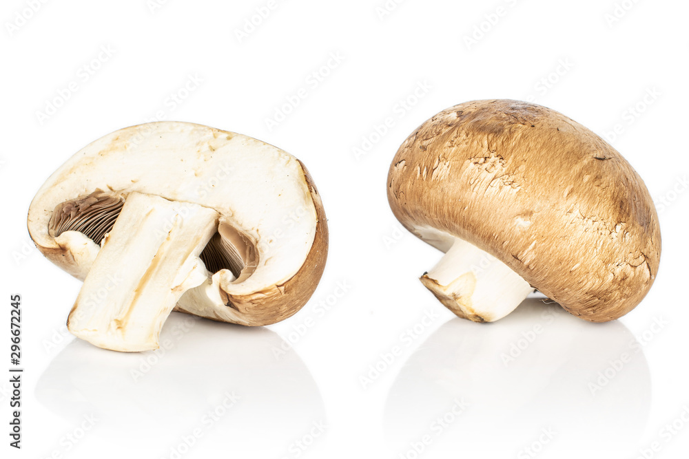 Group of one whole one half of fresh brown mushroom champignon isolated on white background Group of one whole one half of fresh brown mushroom champignon isolated on white background