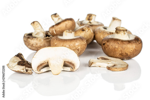 Group of seven whole one half one slice one piece of fresh brown mushroom champignon isolated on white background