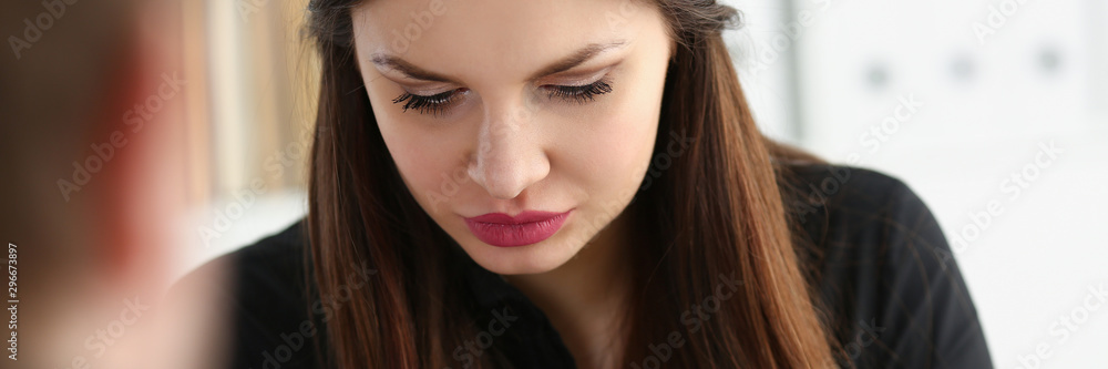 Man and smiling mature woman talking in office Man and smiling mature woman talking in office
