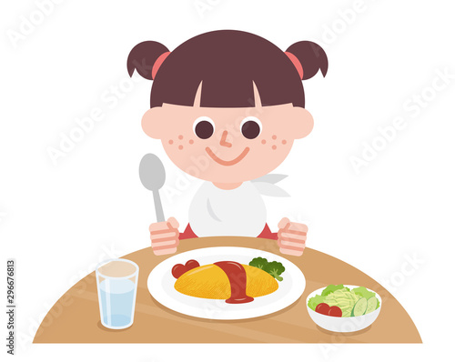 Girl eating omelet rice