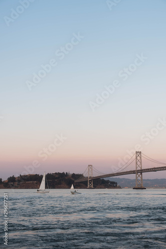 Sailboats in the bay at dusk