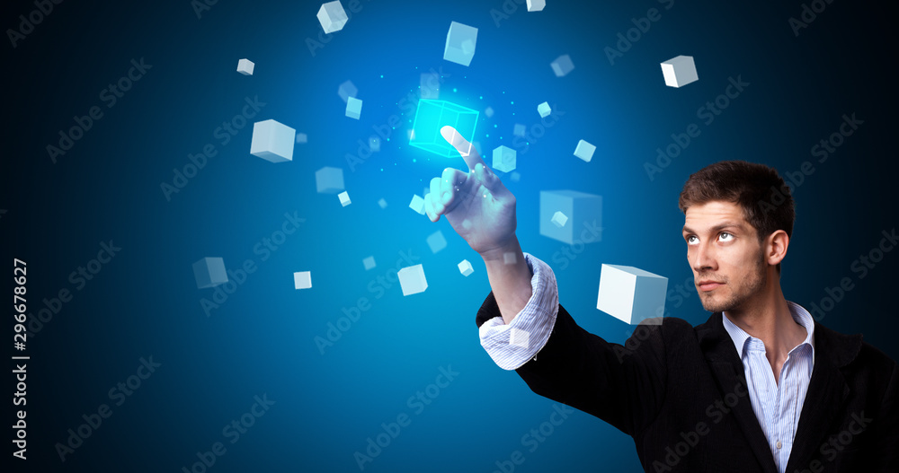 Man touching hologram screen displaying cube symbols Man touching hologram screen displaying cube symbols