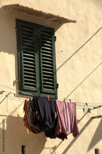 Laundry hanging outside Tuscan village home, Fornacette near Florence © elliottcb