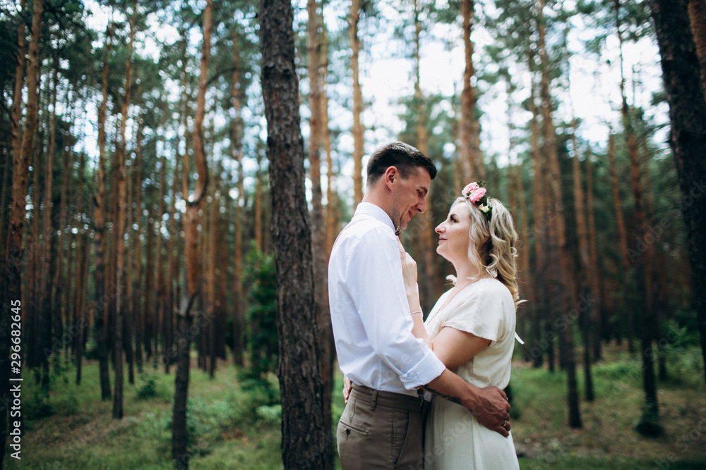 Beautiful wedding couple in a forest Beautiful wedding couple in a forest