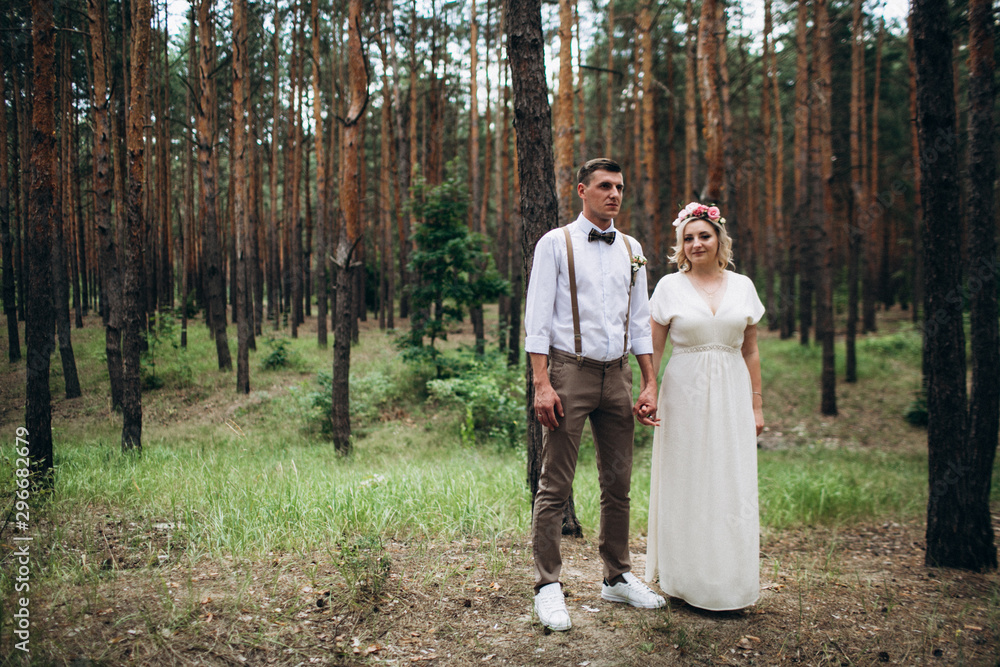 Beautiful wedding couple in a forest Beautiful wedding couple in a forest