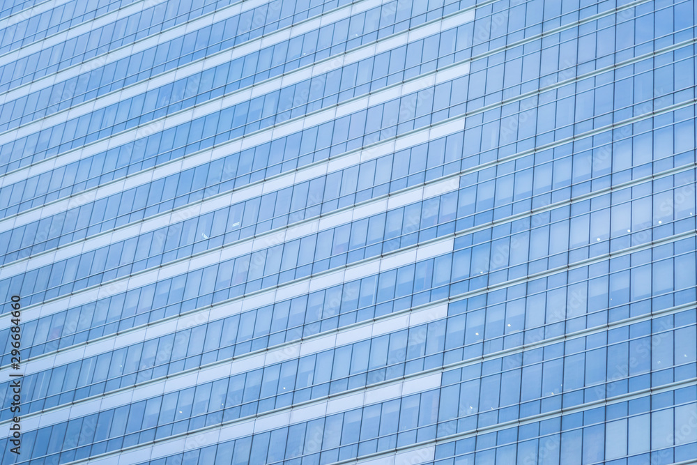 Blue glass windows of modern office building Blue glass windows of modern office building