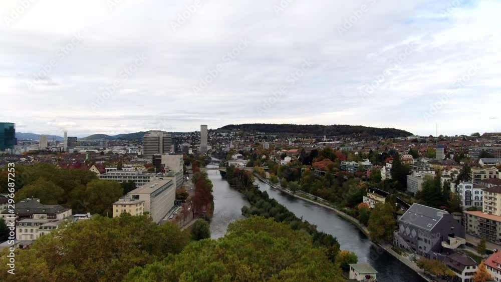 Forward moving aerial dolly shot of a residential houses / rich cityscape in downtown Zurich, Switzerland along the Limmat river Forward moving aerial dolly shot of a residential houses / rich cityscape in downtown Zurich, Switzerland along the Limmat river
