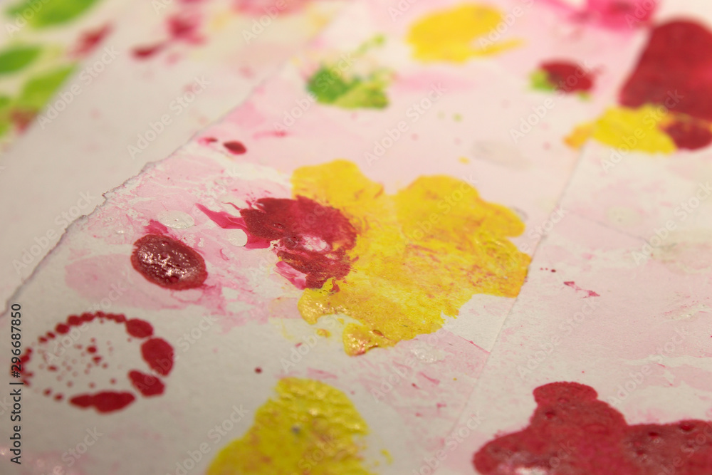 Naklejka premium This a photograph of a Red,White,Yellow and Green abstract design created using nail polish