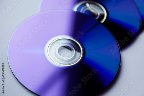 several blu ray discs are in the window on light background