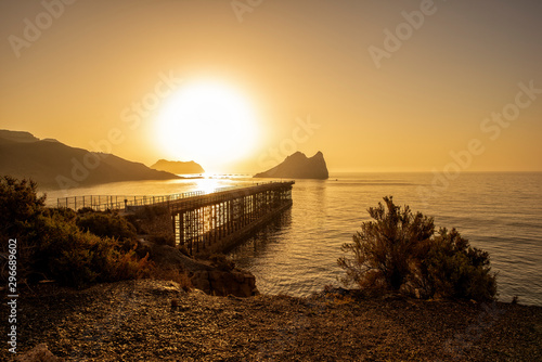 Fotografie Sunrise on a beach in Aguilas, Murcia