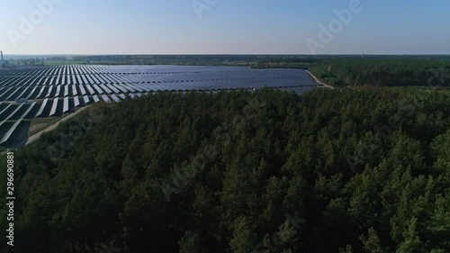 Wallpaper Mural Aerial drone footage. Flight over solar panel farm. Renewable green alternative energy Torontodigital.ca