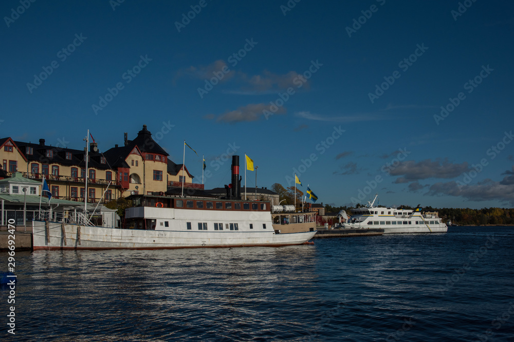 Autumn view at Vaxholm in the Stockholm archipelago, boats, ferries and fortress