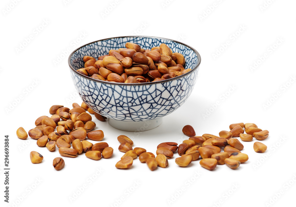 Heap of pine nut close up on white background Heap of pine nut close up on white background