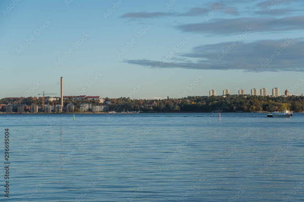 Autumn sea landscape in the inner harbour of Stockholm with ferries and boats.