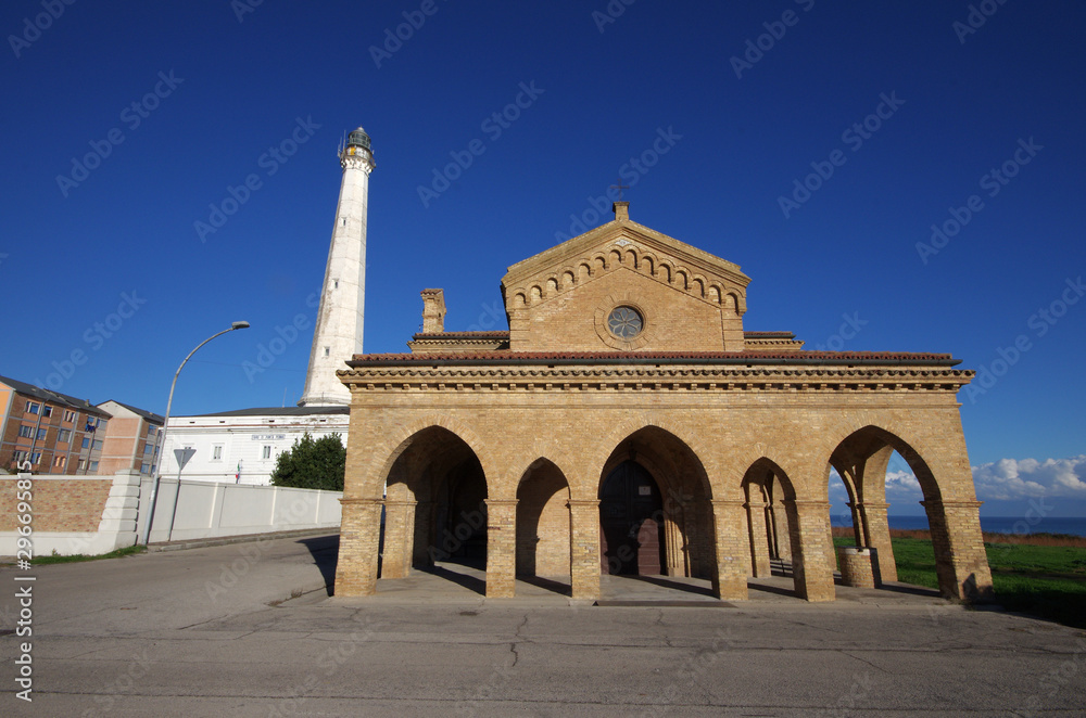 The small church of Santa Maria della Penna and the lighthouse, Punta Penna, Vasto, Abruzzo, Italy