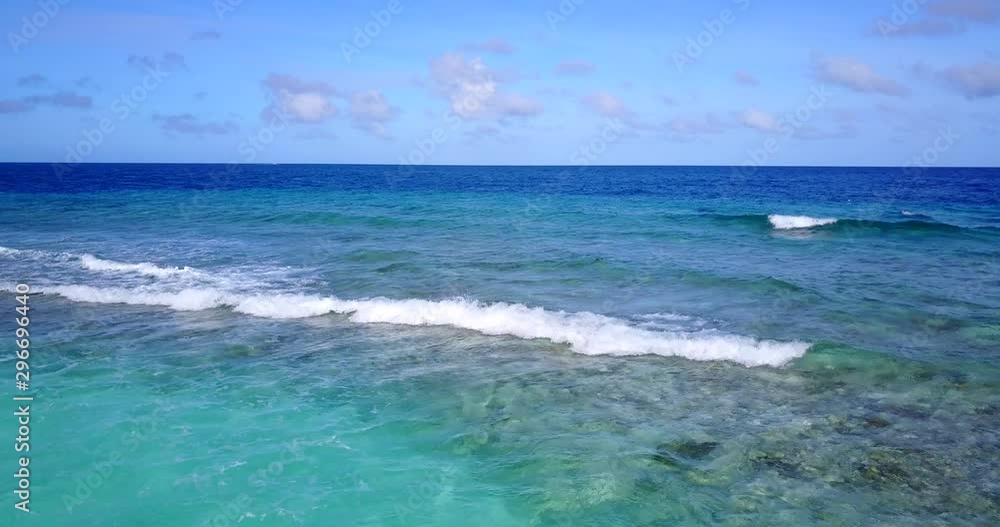 Small white waves on a blue turquoise exotic view of ocean from Hawaii islands Small white waves on a blue turquoise exotic view of ocean from Hawaii islands