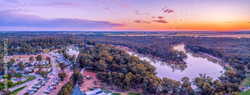 Aerial panorama of Murray River and holiday park at sunset. Moama, New South Wales, Australia photo