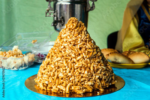 Chak-chak traditional asian sweet dessert - fried dough with honey. Oriental sweets. Traditional dessert on nikah Muslim wedding. photo