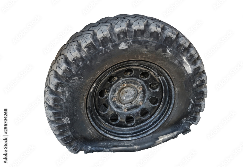 Obraz premium Punctured car wheel, tire isolated on a white background