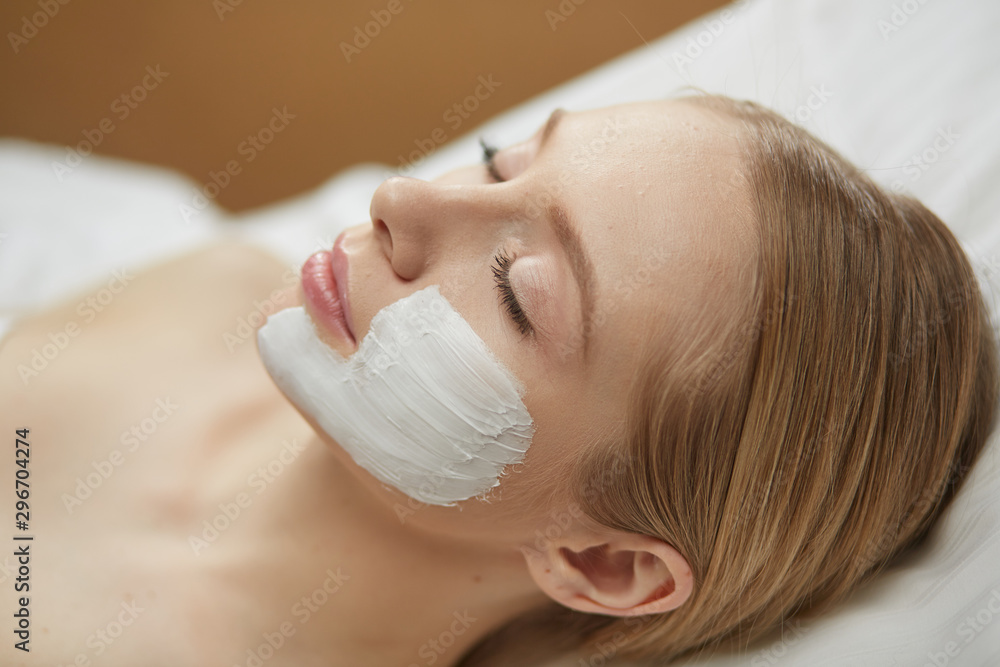 Young beautiful girl at the reception of a beautician