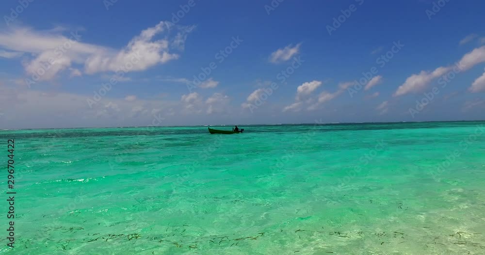fishing boat in the tropical emeralds sea water rich with fish. horizon, exotic travel destination background fishing boat in the tropical emeralds sea water rich with fish. horizon, exotic travel destination background
