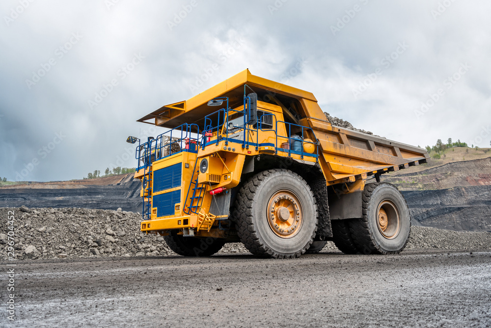 Large quarry dump truck. Transport industry. Large quarry dump truck. Transport industry.