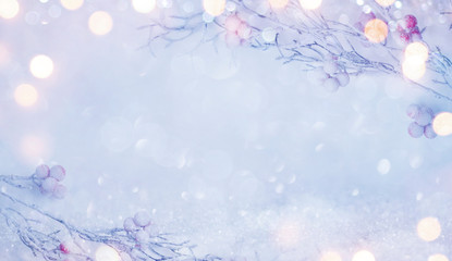 Abstract winter holidays background with snowy branches and red berries