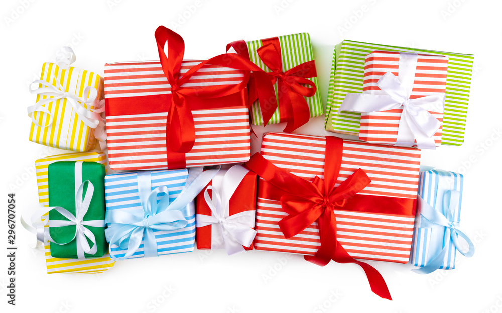 Fototapeta premium Top view of pile of christmas gifts on white background