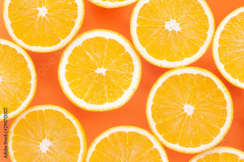slices of orange isolated on orange background