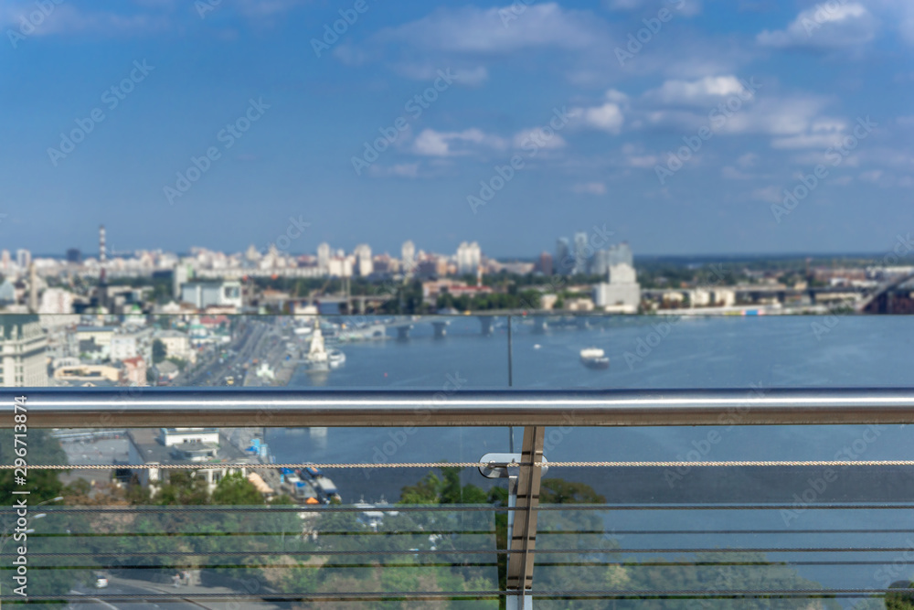 VBlurred vew on River Dnepr, bridge and city center of Kiev, Ukraine on a sunny day