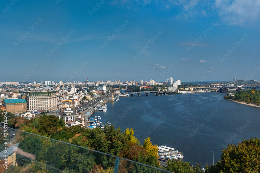Panoramic view city center of Kiev, river Dnipro and bridge near the Arch of Friendship of Peoples from the glass bridge