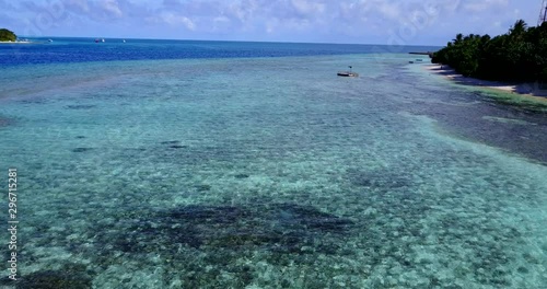 Tropical Crystal clear sea water rich with corals. Bahamas photo