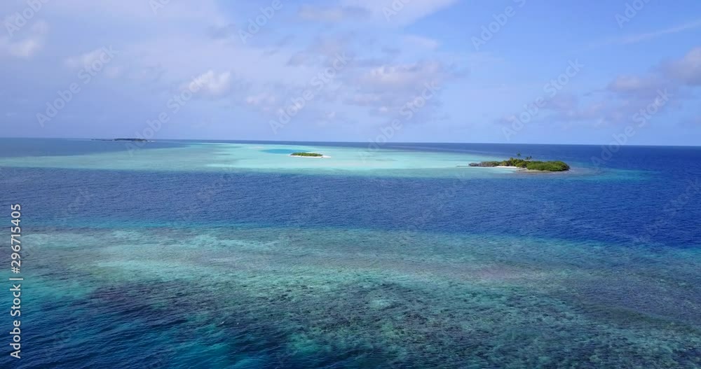 crystal clear water of indian ocean, waves gently splashing on one of the sandbars in Zanzibar Archipelago, aerial drone panoramic shot crystal clear water of indian ocean, waves gently splashing on one of the sandbars in Zanzibar Archipelago, aerial drone panoramic shot