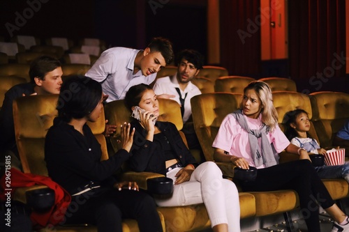 group of young people in cinema