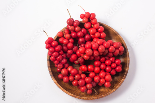 Schisandra chinensis or five-flavor berry. Fresh red ripe berries photo