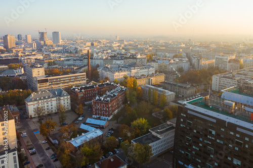 Aerial view of a beautiful cityscape with skyscrapers and buildings at sunrise. Warsaw Poland. 16. October. 2019. Drone flies of a beautiful cityscape with skyscrapers at sunrise. 