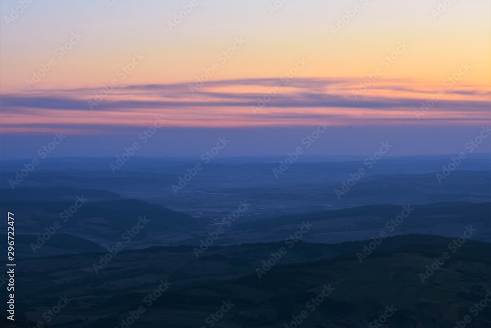 sunset over the hills and valleys in Transylvania