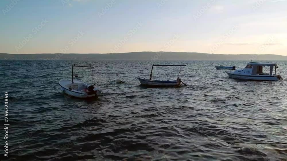 Fisherman boats moving with sea waves. Sea waves and relaxation. Fisherman boats moving with sea waves. Sea waves and relaxation.