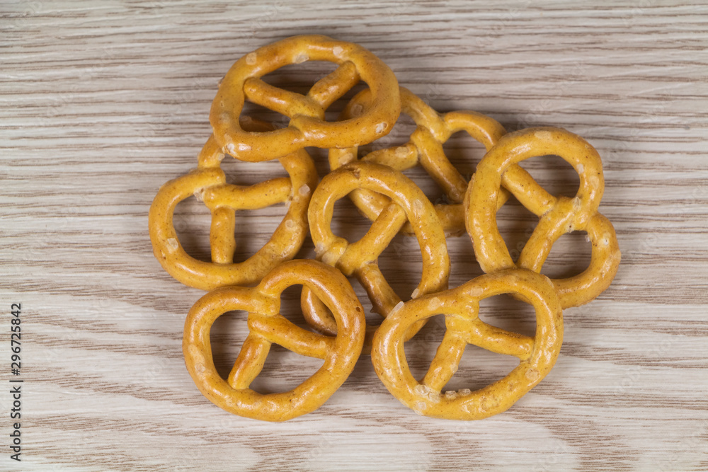Bretzel biscuits for appetizer on wooden background Bretzel biscuits for appetizer on wooden background