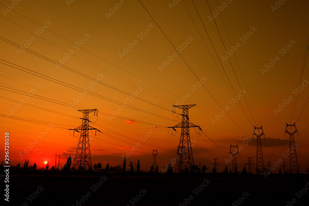 electric tower in the setting sun